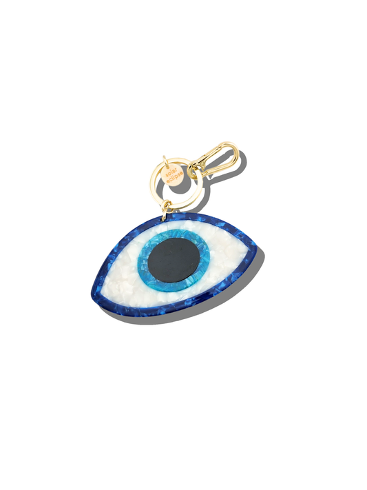 Evil eye keychain with gold accent on a white background