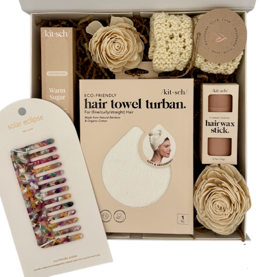 Kit-sch hair care product set including a hair towel turban, hair wax stick, and hair clips in a box.